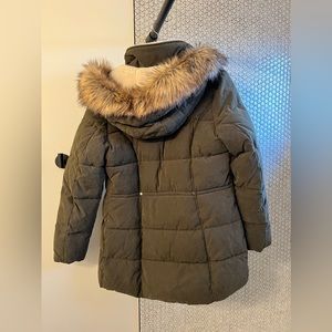 Mid-length army green puffer coat with Sherpa lined removable fur hood. Like new